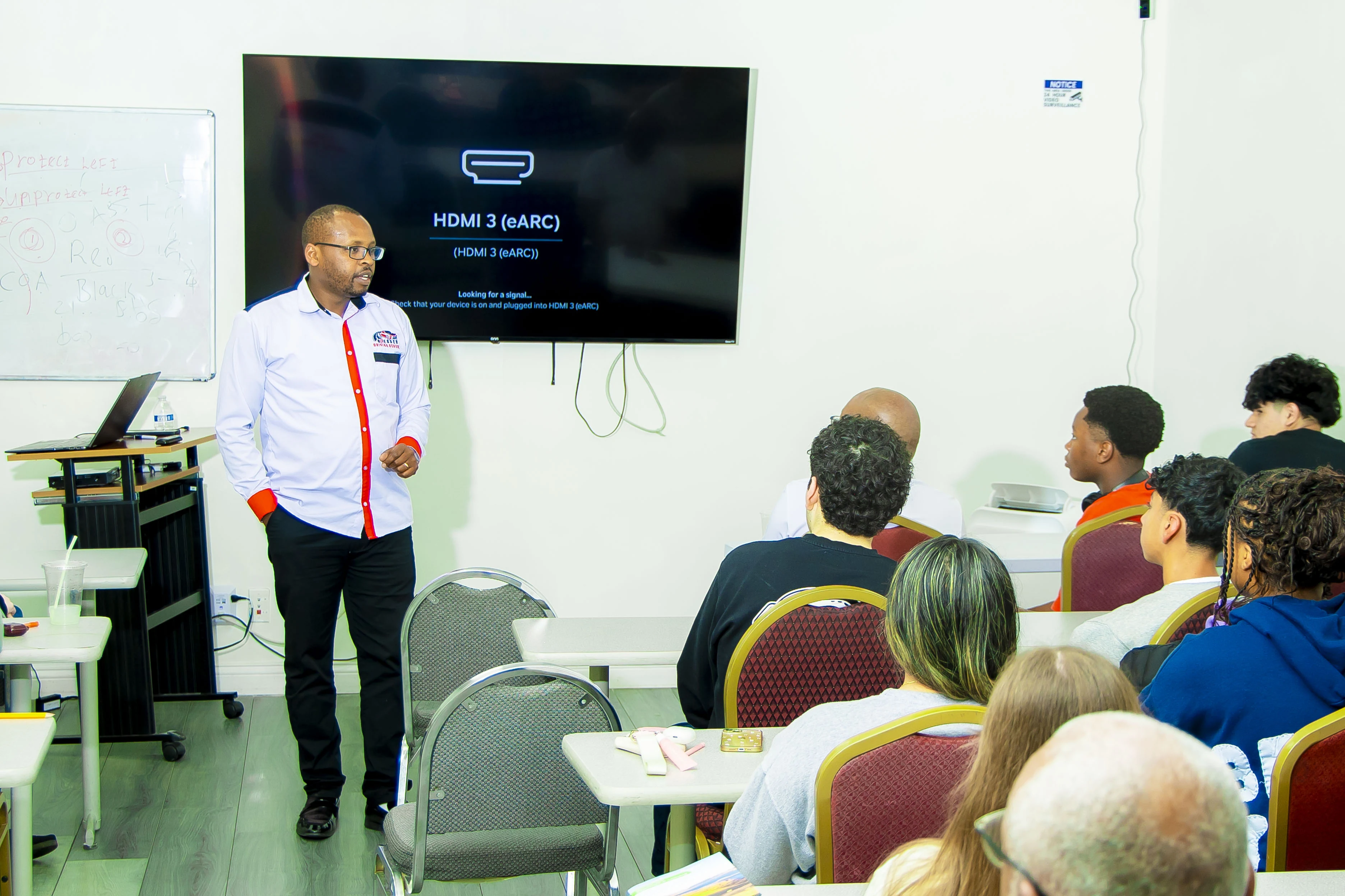 Instructor leading a classroom learning session