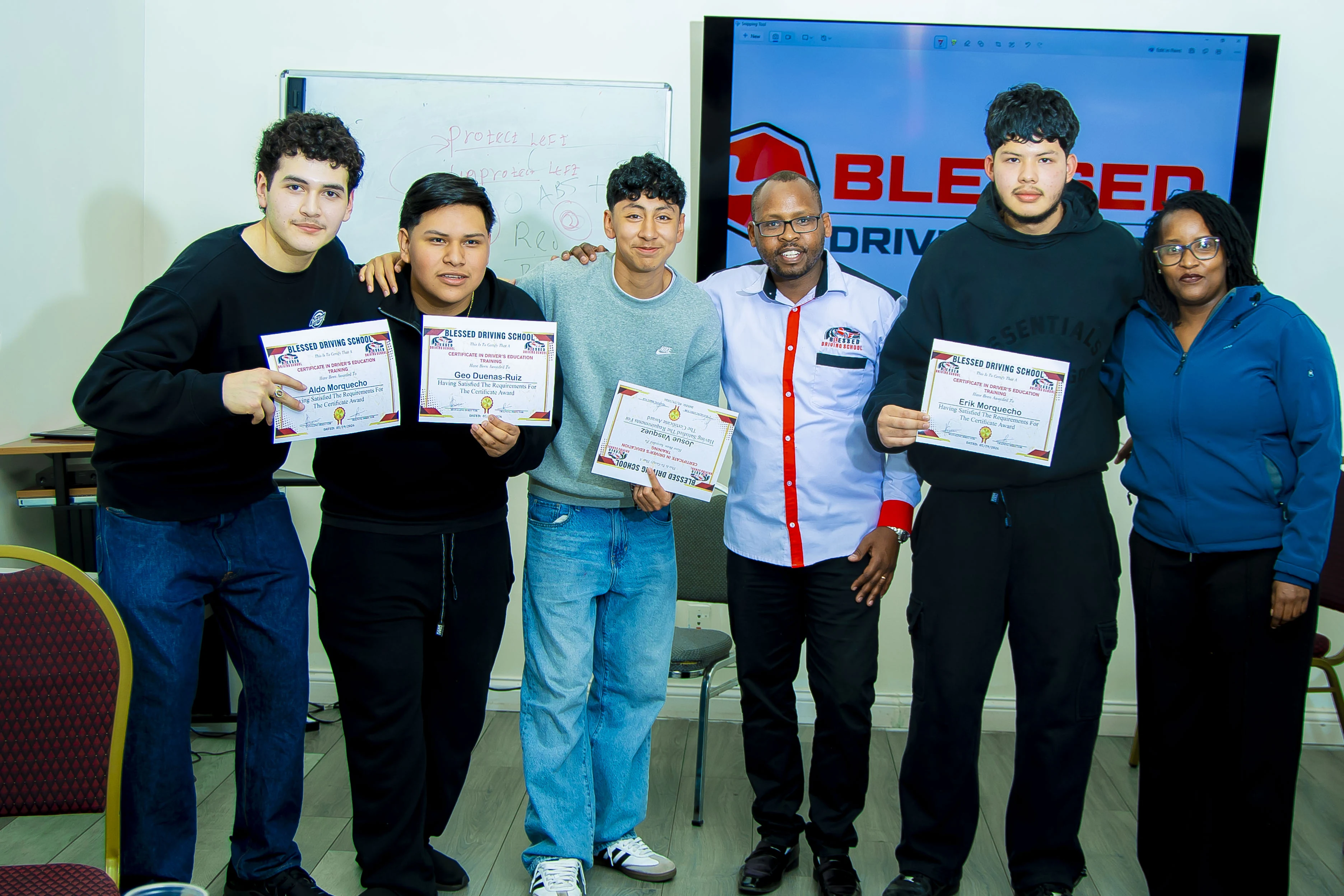 Students and school team at a celebration