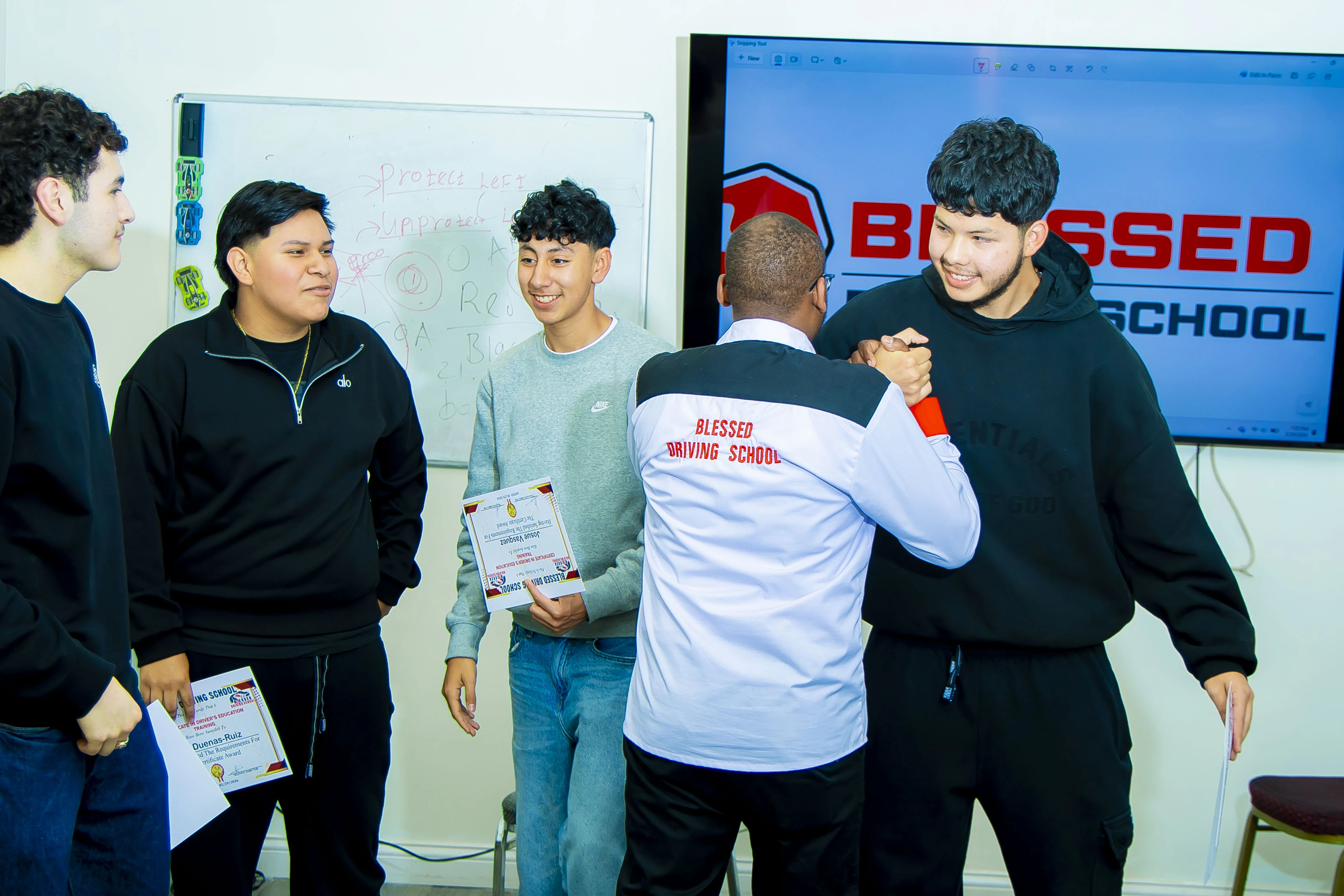 Instructor supporting students during a learning milestone